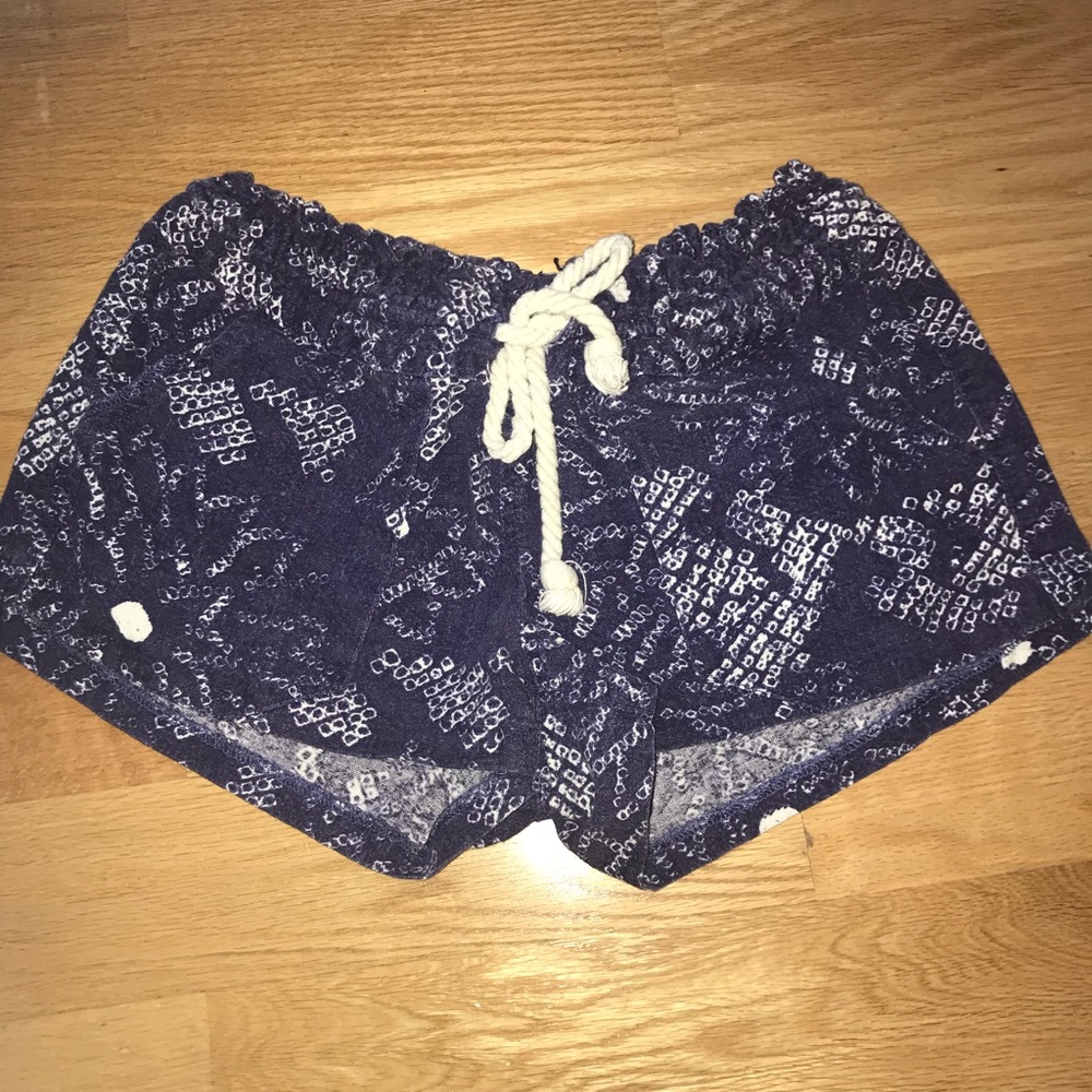 dark blue shorts with little white designs